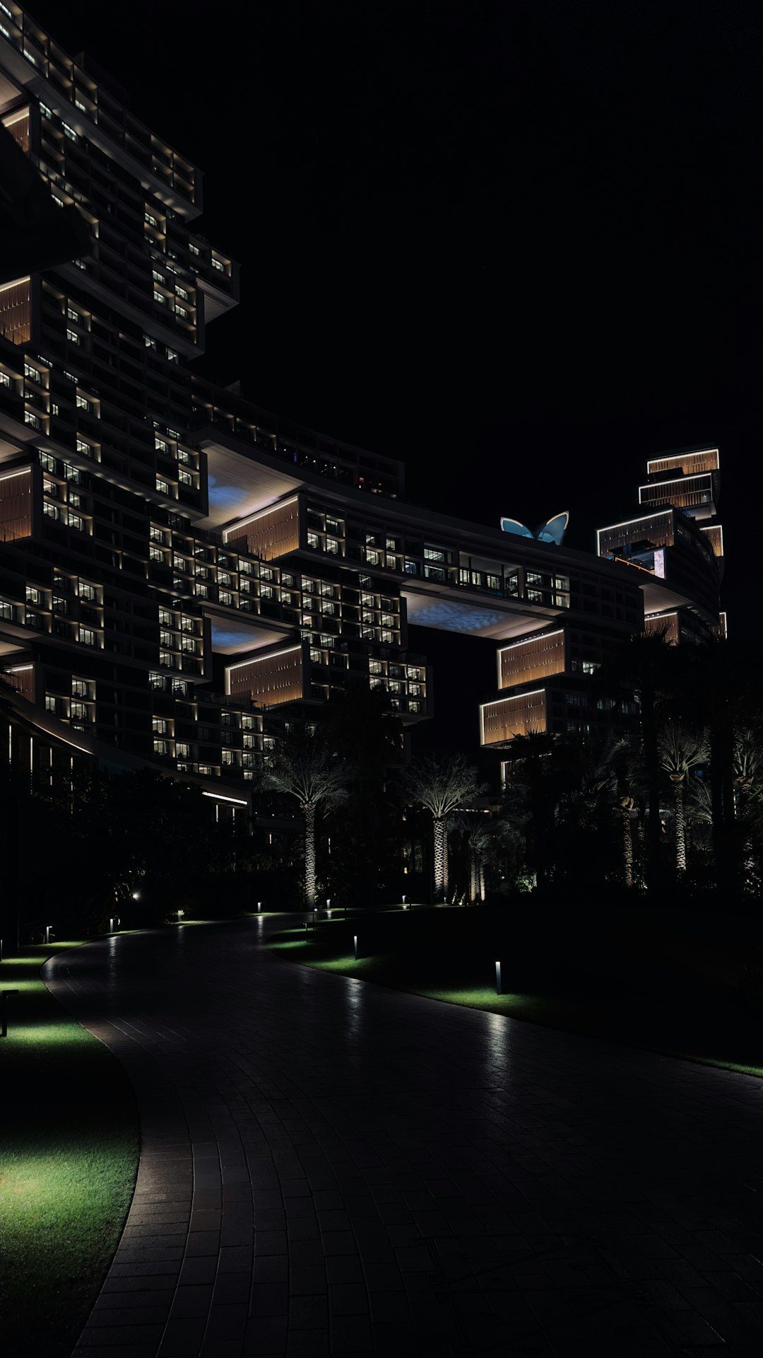 Modern UAE luxury architecture at night, representing professionally managed property